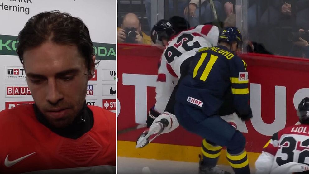 Österrikes Bernd Wolf och tackling i Sverige-Österrike på ishockey-VM.