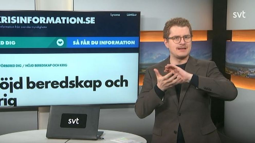 Programledaren tecknar ordet ”kris”