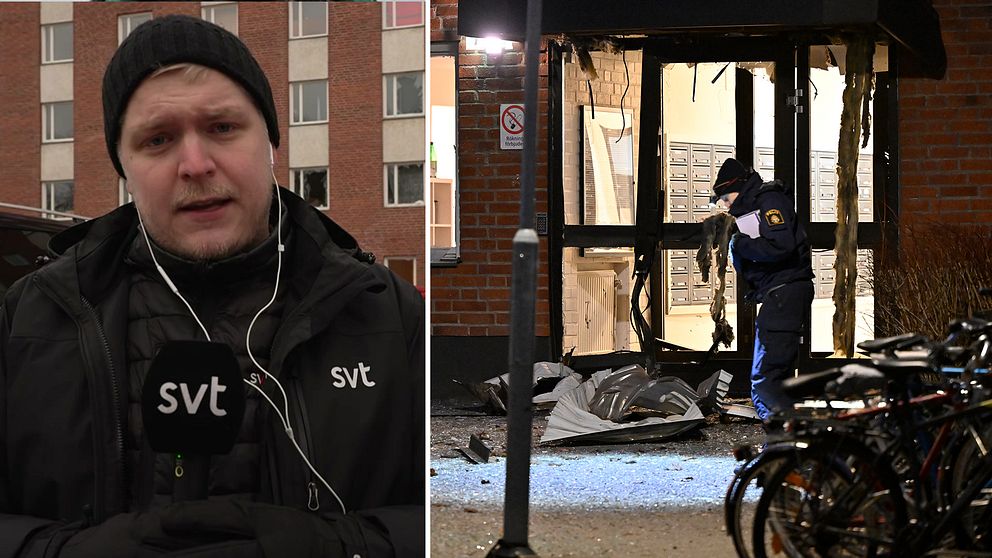 Jimmt Kirvesmäki står iförd mössa och jacka med mikrofon framför huset där det sprängdes. Till höger en polis framför den sprängda porten.