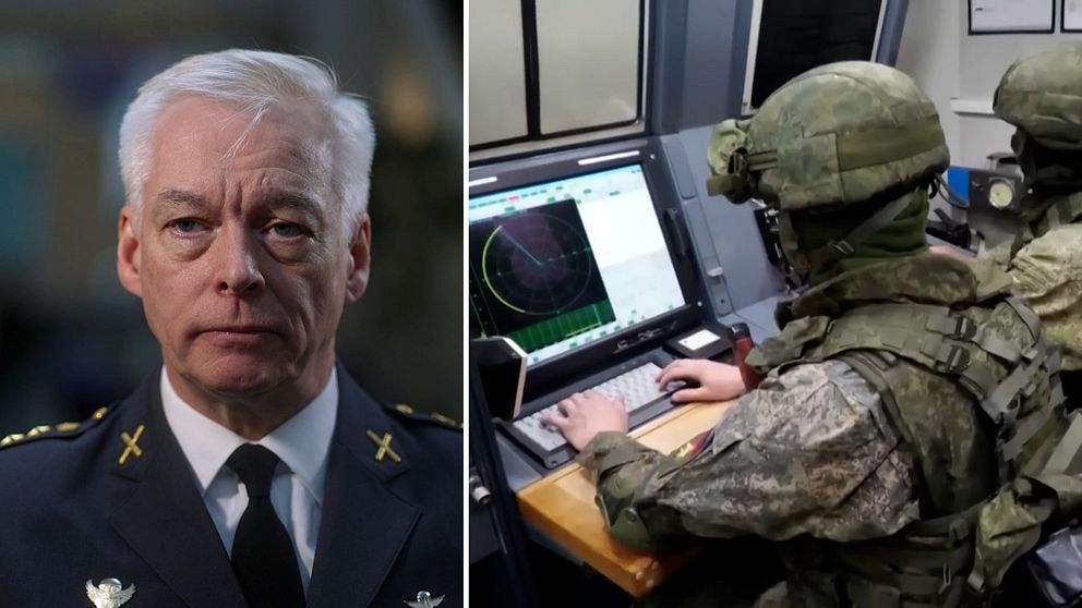 Militär sitter på en dator med GPS-sändare.