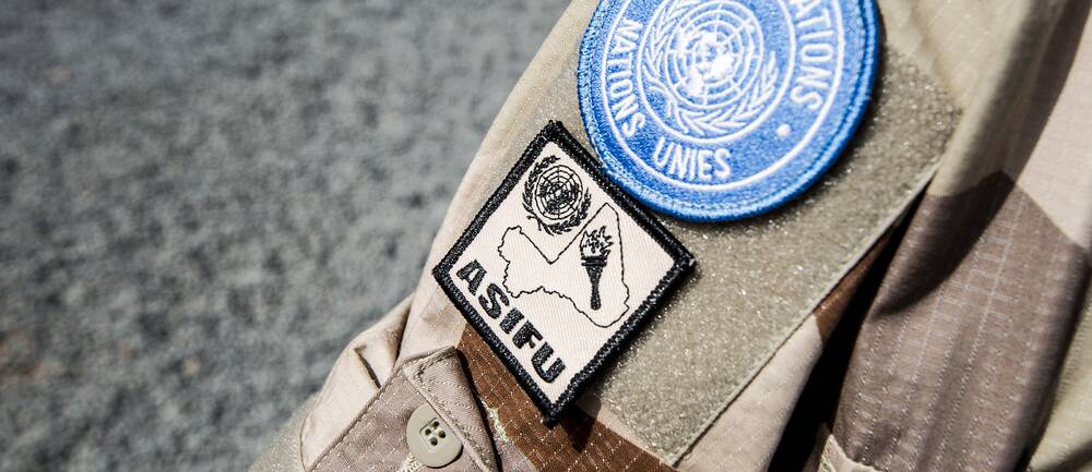 Emblemet för FN-insatsen Minusma på en soldats arm.