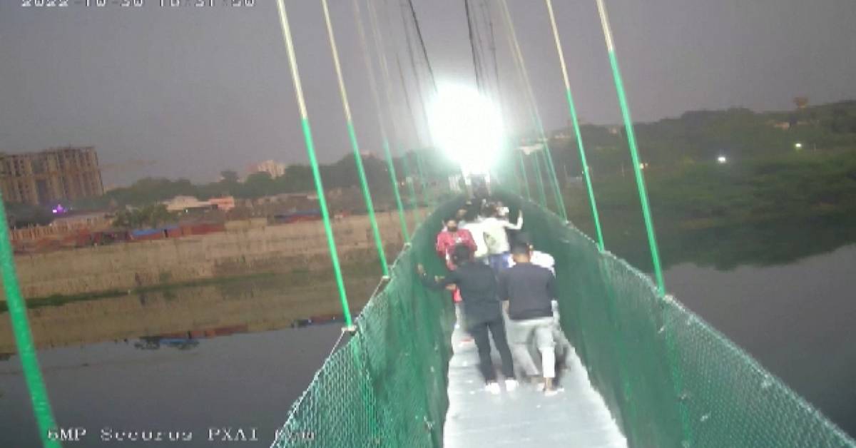 Clip shows the moment when the suspension bridge in India collapsed