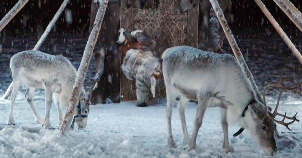 Here he breaks a world record standing on his hands in the snow for