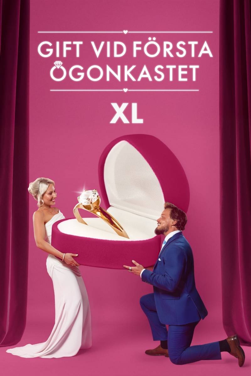 Gift vid första ögonkastet XL: ett brudpar med en jättelik ring i ett rosa ringetui