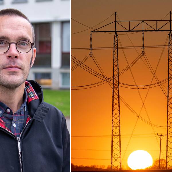 En solnedgång bakom en elledning