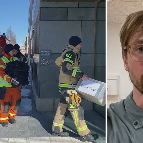 Flera räddningstjänstpersonal bär saneringsutrustning utanför länsstyrelsen i Östersund efter ett pulverlarm. Reporter Fredrik Eliasson tittar in i kameran när han berättar vad som hänt