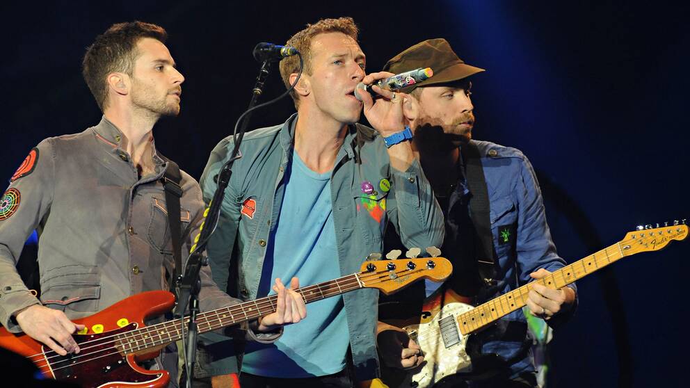 Guy Berryman, Chris Martin och Jonny Buckland från Coldplay.