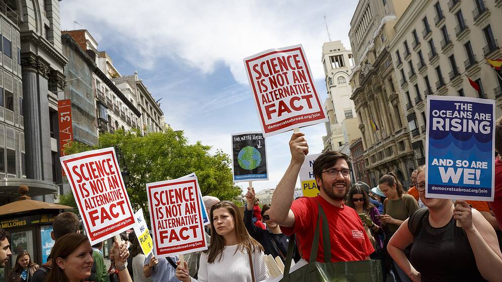 People protest holding banners at the March for Science event in Madrid, Saturday, April 22, 2017. Thousands of scientists worldwide left their labs to take to the streets Saturday along with students and research advocates in pushing back against what they say are mounting attacks on science. (AP Photo/Daniel Ochoa de Olza)