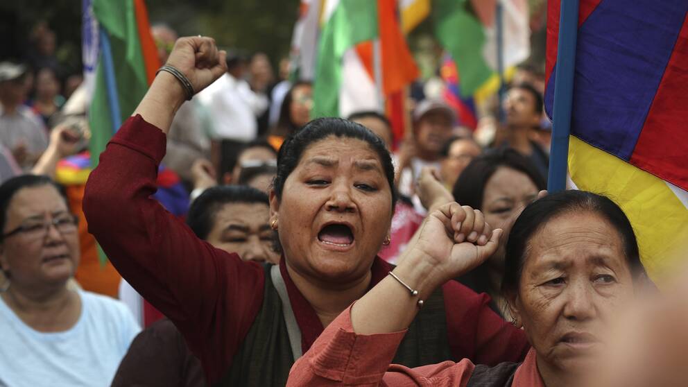 Exiltibetaner i Indien demonstrerar mot Kinas regering förra månaden. De har inget med det svenska åtalet att göra.