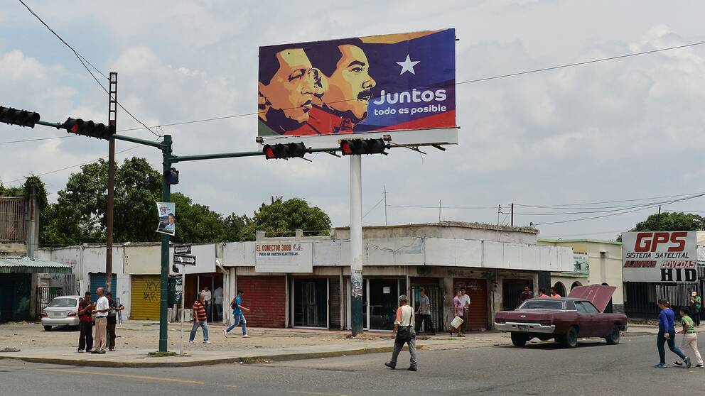 Valreklam i Venezuela föreställande den sittande presidenten Nicolas Maduro och avlidne Hugo Chavez.