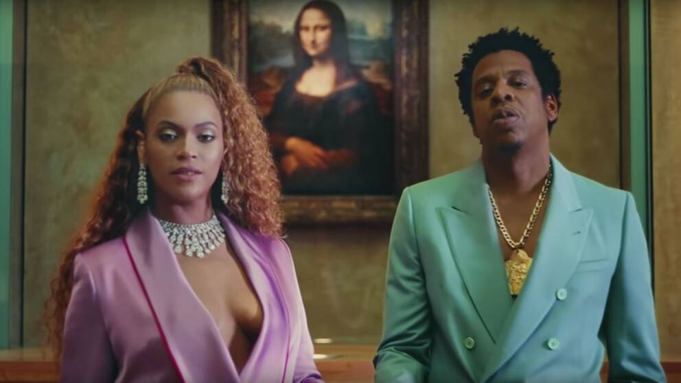 Beyoncé och Jay-Z framför Mona Lisa.