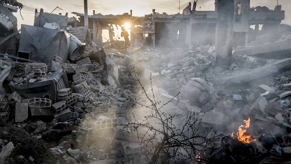 Förstörda hus i staden Kobane i norra Syrien i mars 2015.