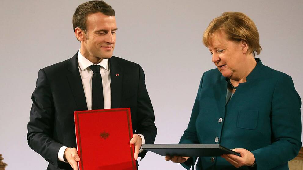 Frankrike och Tyskland vill fördjupa sitt samarbete inom många områden i ett fördrag som de skrev under under en ceremoni i Aachen. 