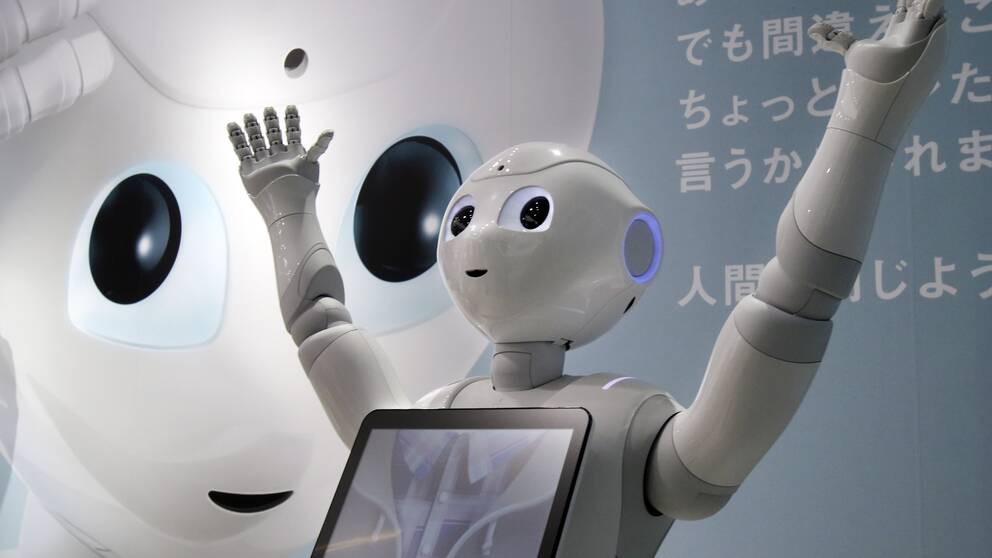 Roboten Pepper visas upp på Softbank Mobile i Tokyo 6 juni.