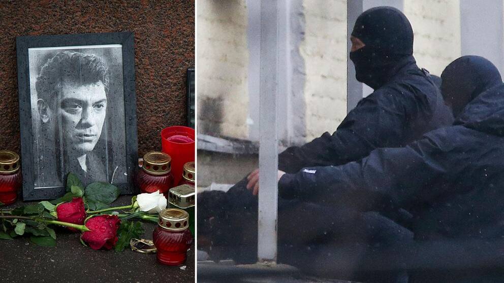 En av de misstänkta för Nemtsov-mordet förs in i domstolen av ryska poliser