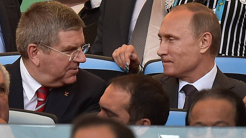 Thomas Bach och IOK vill stoppa idrottare från Vladimir Putins Ryssland.