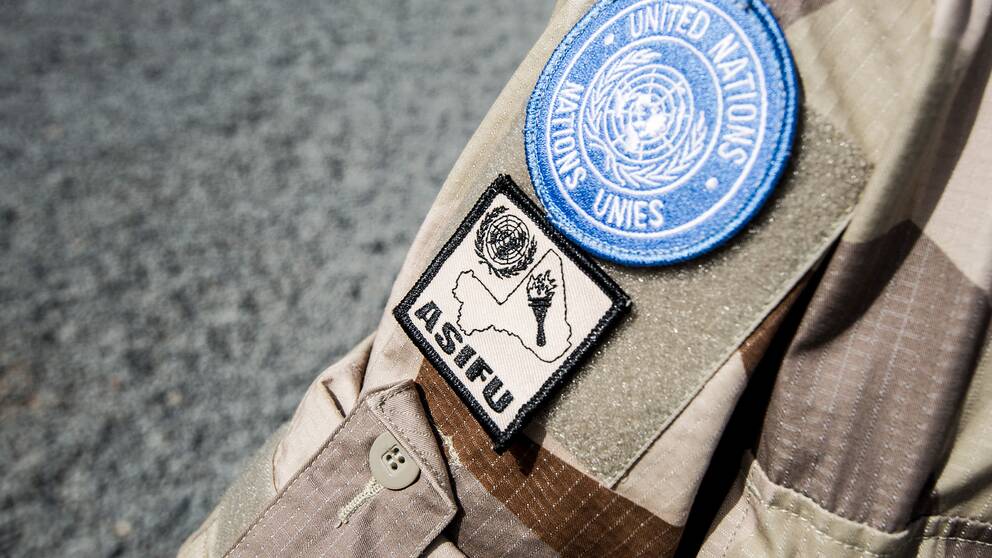 Emblemet för FN-insatsen Minusma på en soldats arm.