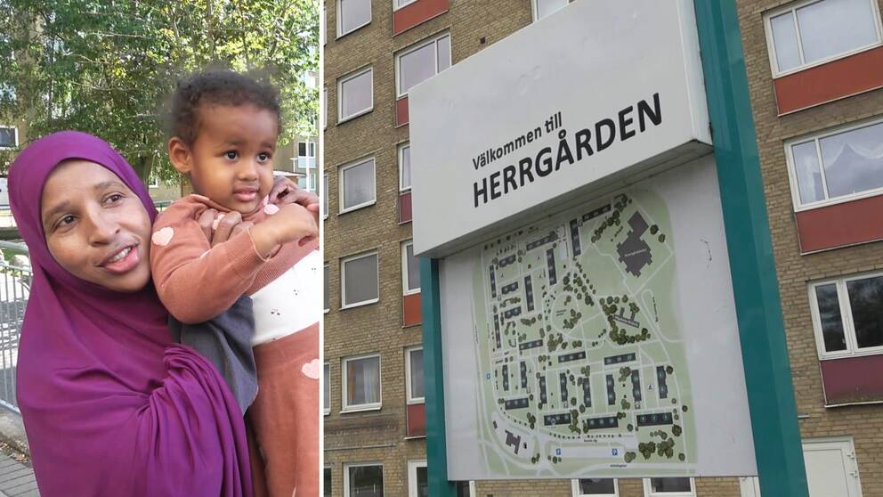 Kvinna med ett barn och en välkommen till Herrgården- skylt.