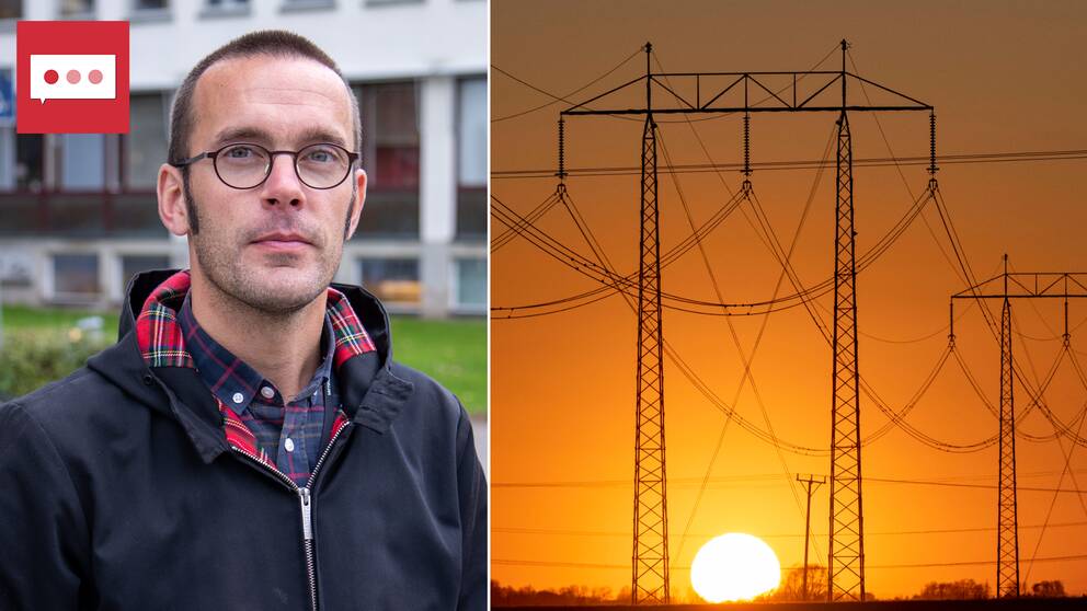 En solnedgång bakom en elledning
