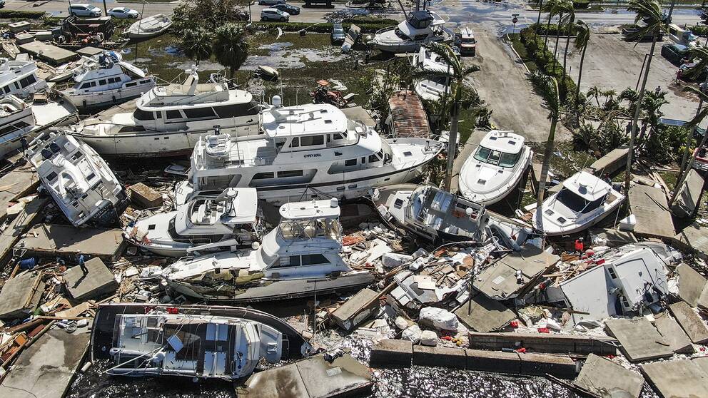 Stormen Ian har orsakat stor förödelse där den dragit fram. Här är spåren efter orkanen i en hamn i Fort Myers, Florida.