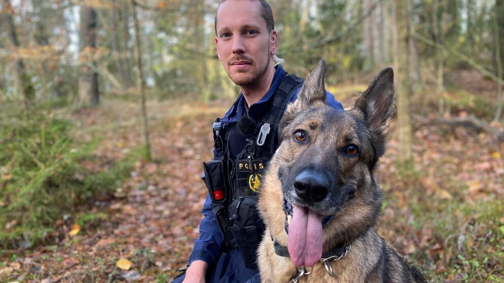 Bild på polishunden Lundy tillsammans med husse och hundförare Jimmy Larsson.