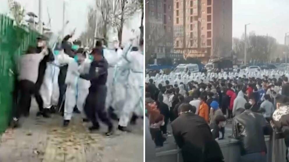 poliser i vita skyddsdräkter konfronterar fabriksarbetarnas protester.