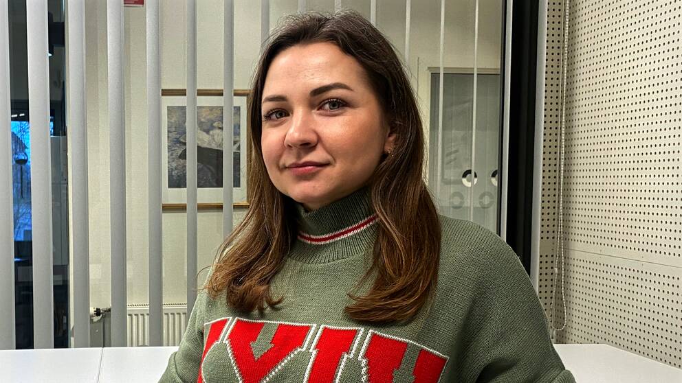 Kateryna Rozenko. Hon har en grön tröja och befinner sig i ett kontor.