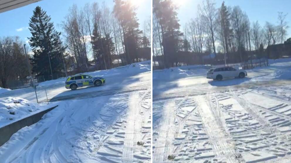 Till vänster i bild syns en polisbil och till höger i bild syns en vit bil.