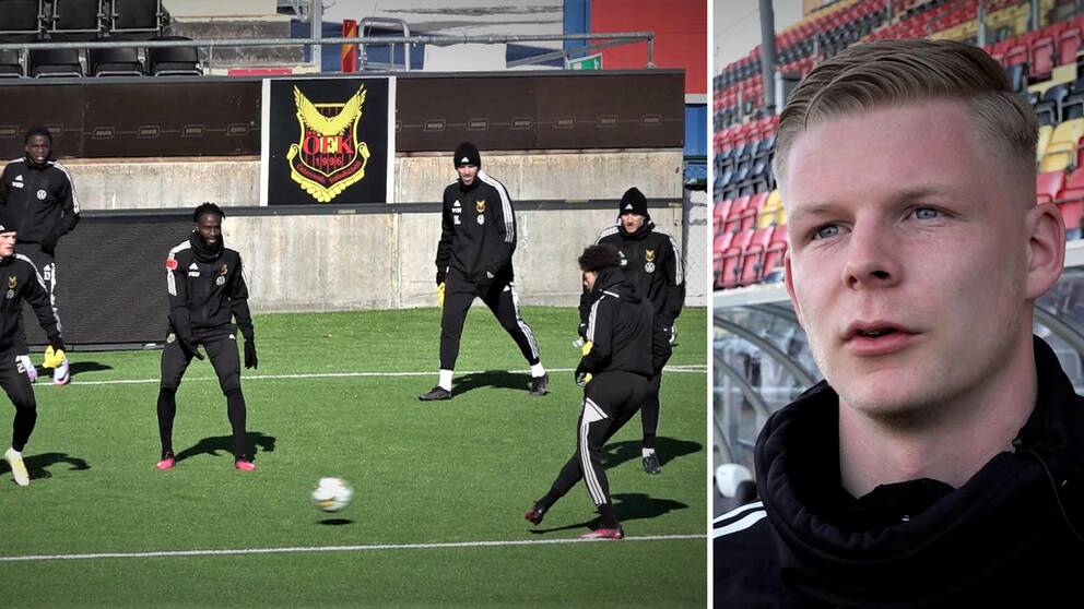Svartklädda fotbollsspelare tränar på en grön konsgräsplan. ÖFKs emblem syns på en mur i bakgrunden.