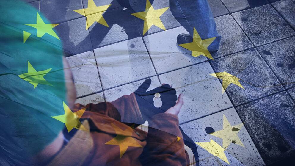Man som tigger och EU-flagga