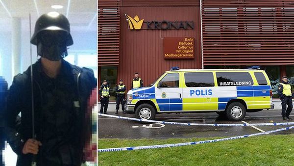 Bilden där gärningsmannen poserar tillsammans med elever på skolan. Eleverna ska ha trott att det var ett skämt och därför ställt upp på bilden.